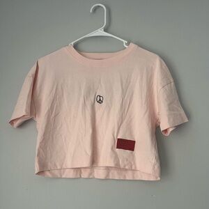 CHNGE baby pink crop top